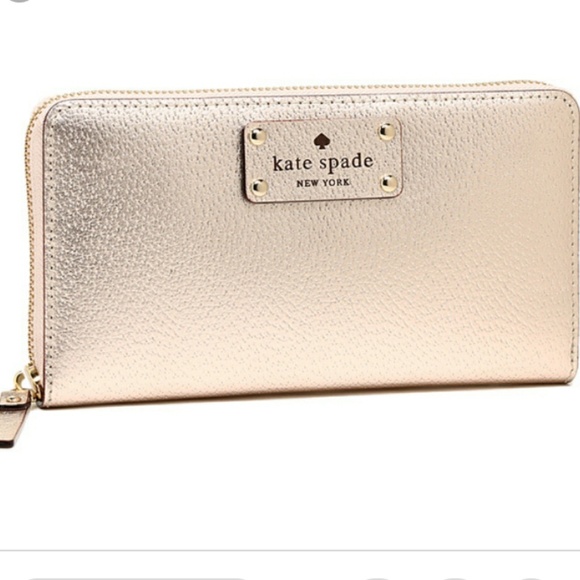 kate spade Handbags - kate spade rose gold wallet